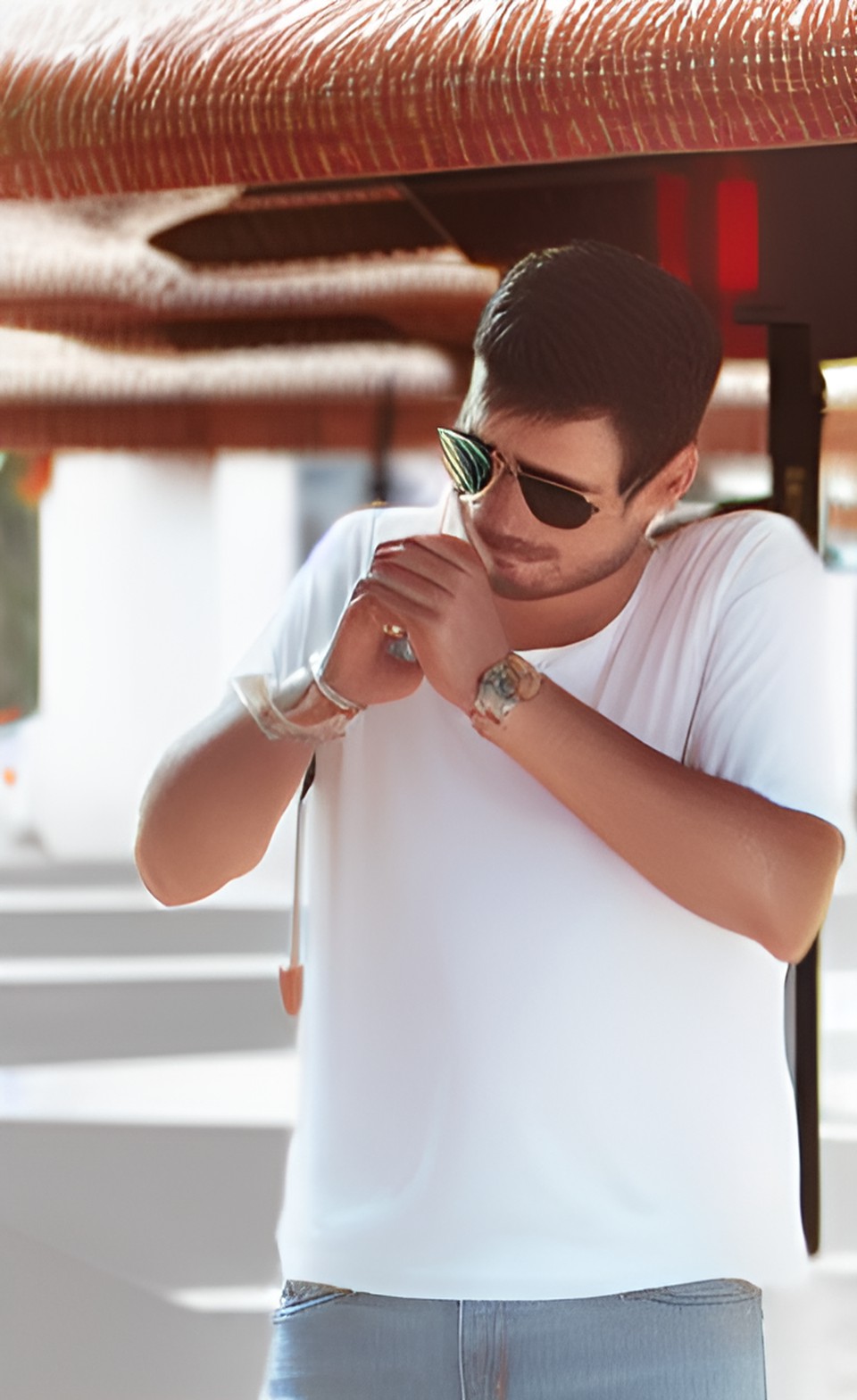 Gwafa Lighting a Cigarette